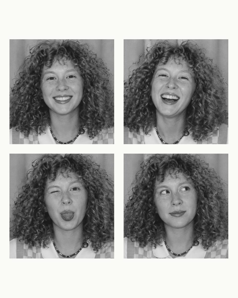 AI-generated: Photobooth Strip AI filter result: woman in a checkered vest holding a smartphone outdoors